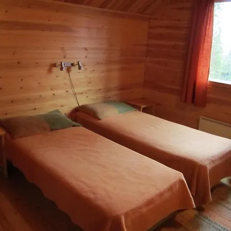 Rukajarven Kelopirtit Cottages Дом отдыха